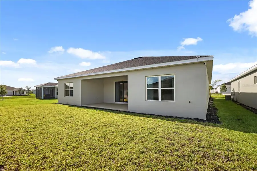 Exterior details and patio area of a home in , Winter Haven (Image 4). Exterior details and patio area of a home in , Winter Haven (Image 4).
