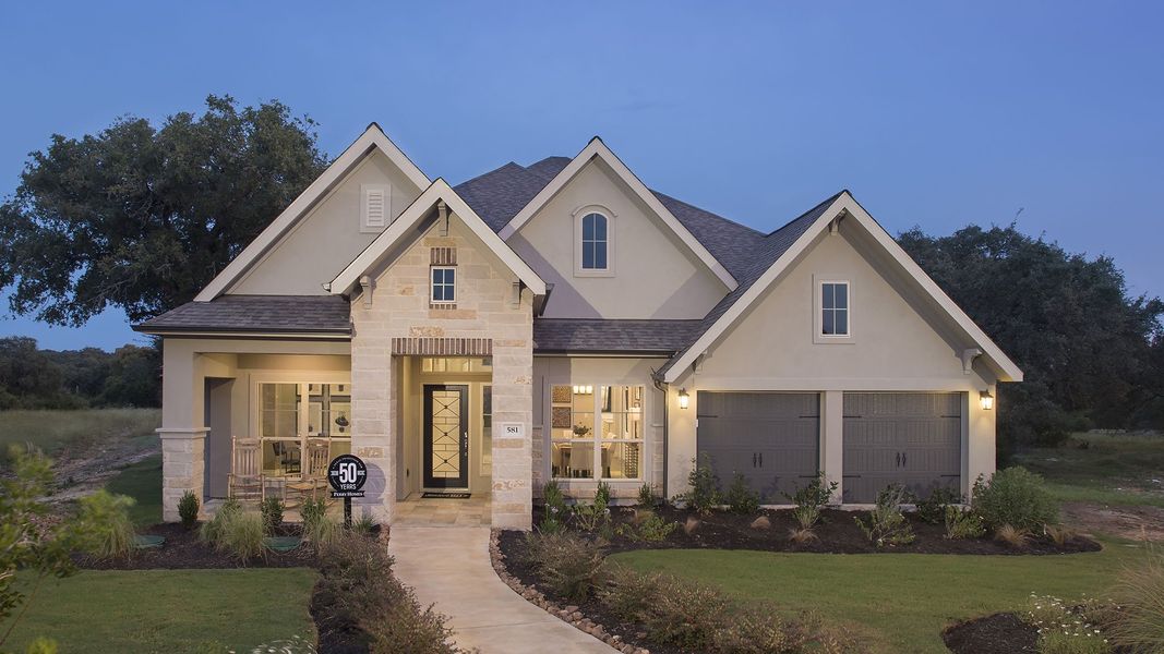 Front exterior of a new home in The Woodlands Hills, Willis, TX, highlighting curb appeal (Image 18). Front exterior of a new home in The Woodlands Hills, Willis, TX, highlighting curb appeal (Image 18).
