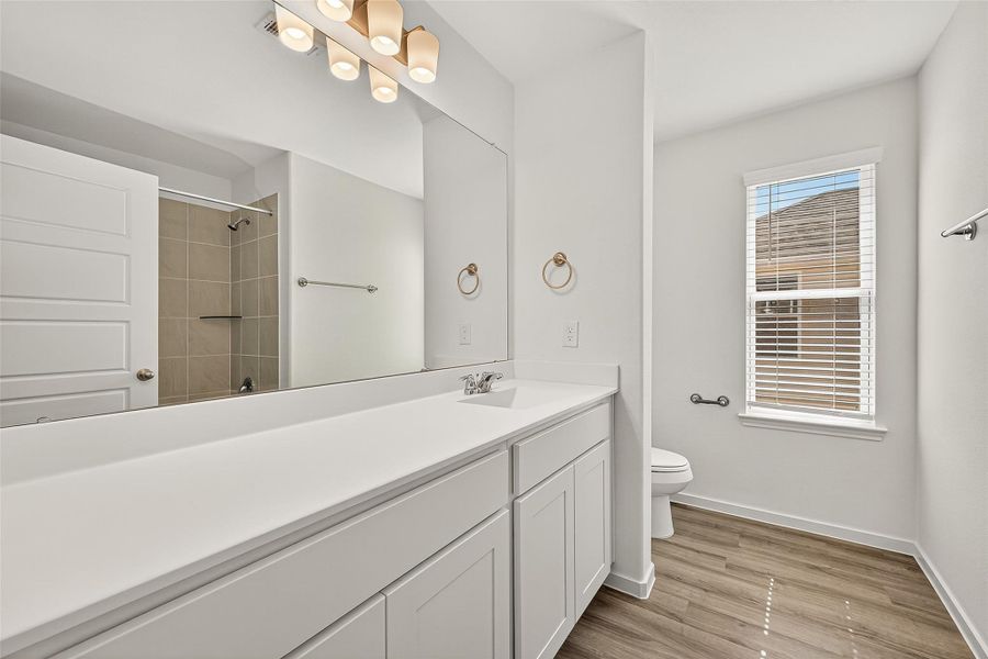 Furnished interior view inside a new home in Mill Creek Trails, Magnolia (Image 28).