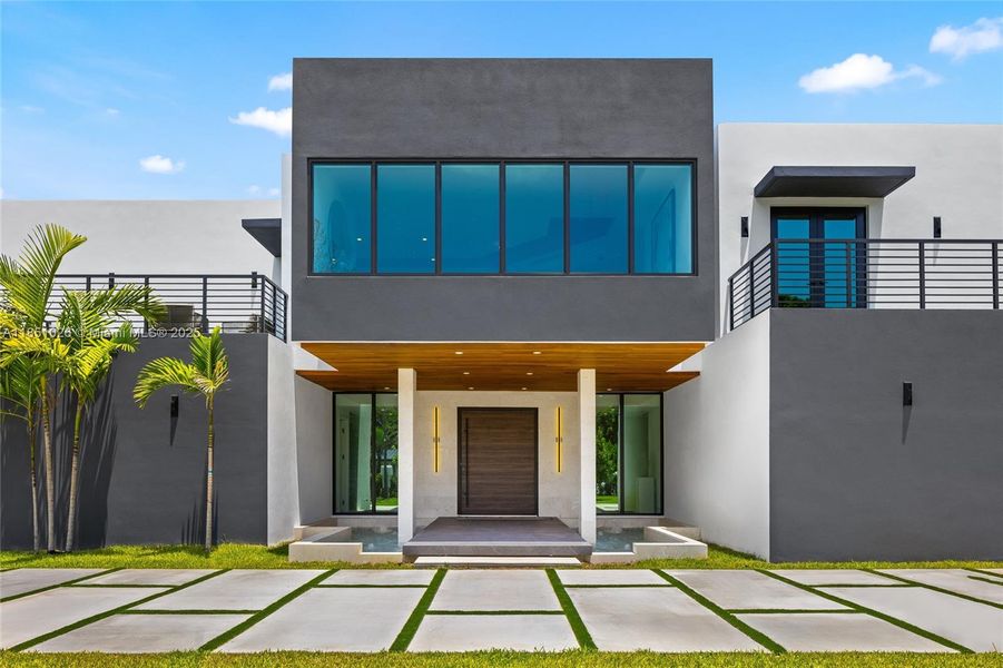 Front exterior of a new home in , Pinecrest, FL, highlighting curb appeal (Image 32).