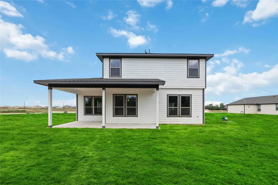 Exterior details and patio area of a home in , Sealy (Image 4).