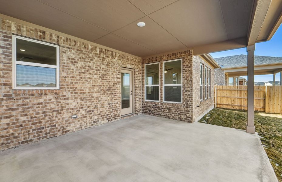 Exterior details and patio area of a home in Sunfield, Buda (Image 27).