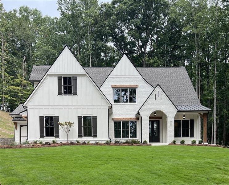 Front exterior of a new home in Woodford, Acworth, GA, highlighting curb appeal (Image 2).