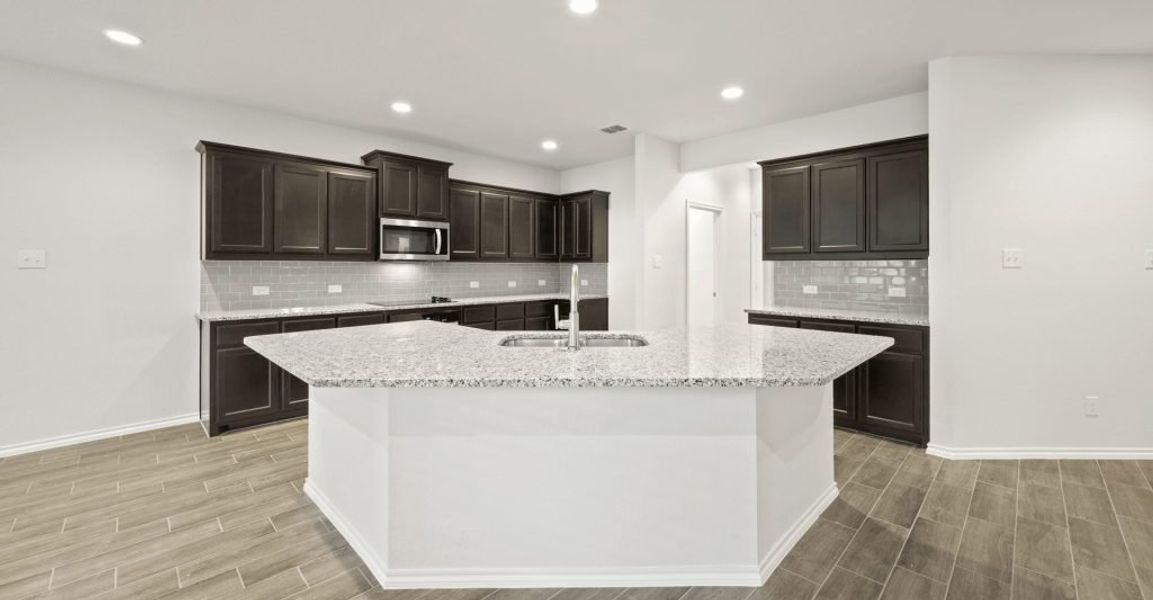 Representative exterior photo of a completed home built from the Hadleigh by Impression Homes in Mountain Valley, Burleson, TX (Image 5). Representative exterior photo of a completed home built from the Hadleigh by Impression Homes in Mountain Valley, Burleson, TX (Image 5).