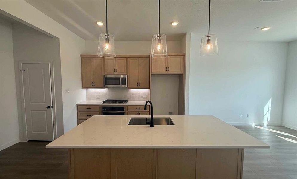 Furnished interior view inside a new home in Collin Creek, Plano (Image 5).