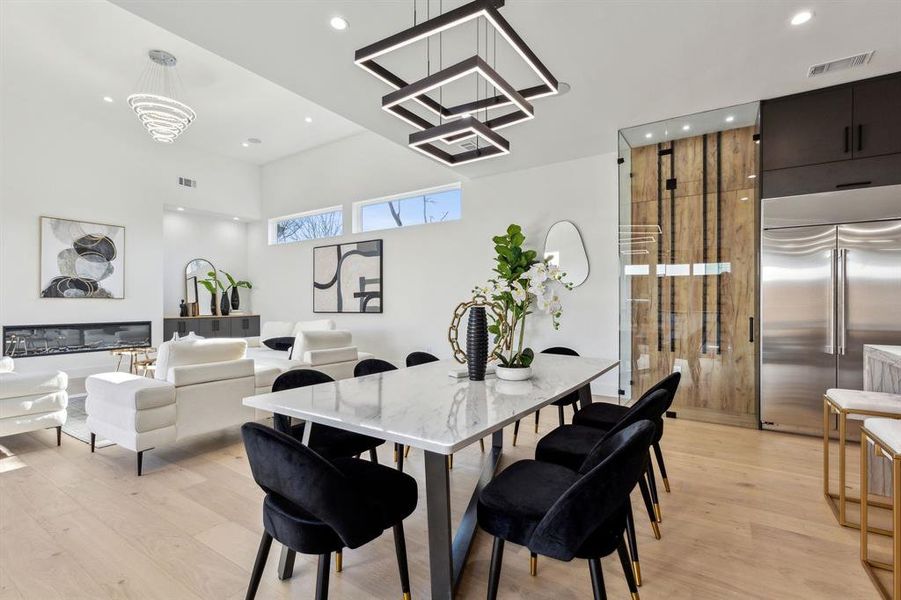 Dining area with light hardwood / wood-style floors