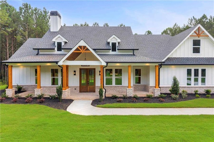 Front exterior of a new home in , Monroe, GA, highlighting curb appeal (Image 34).