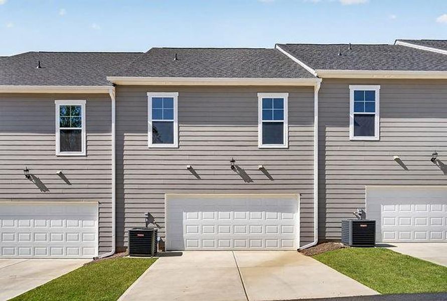 Front exterior of a new home in The Park at Gainesville Township, Gainesville, GA, highlighting curb appeal (Image 2). Front exterior of a new home in The Park at Gainesville Township, Gainesville, GA, highlighting curb appeal (Image 2).
