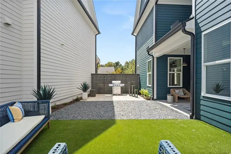 Exterior details and patio area of a home in Harmony, Auburn (Image 3). Exterior details and patio area of a home in Harmony, Auburn (Image 3).