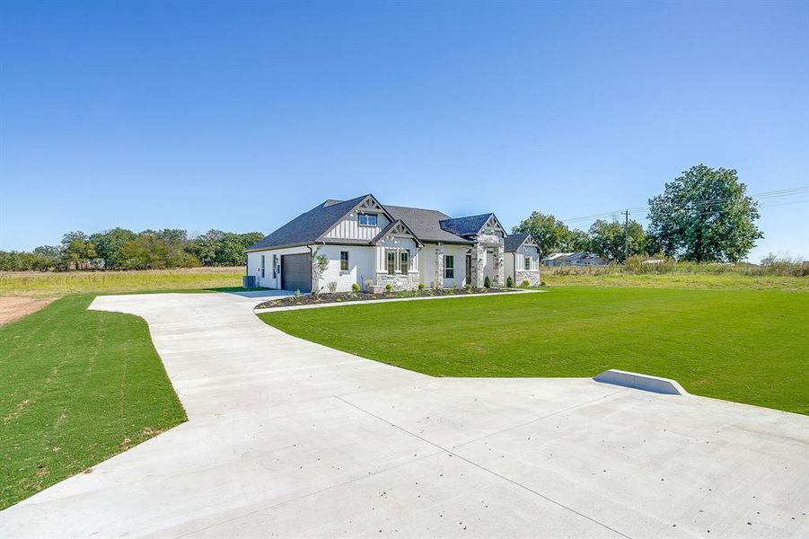Exterior details and patio area of a home in , Poolville (Image 2). Exterior details and patio area of a home in , Poolville (Image 2).