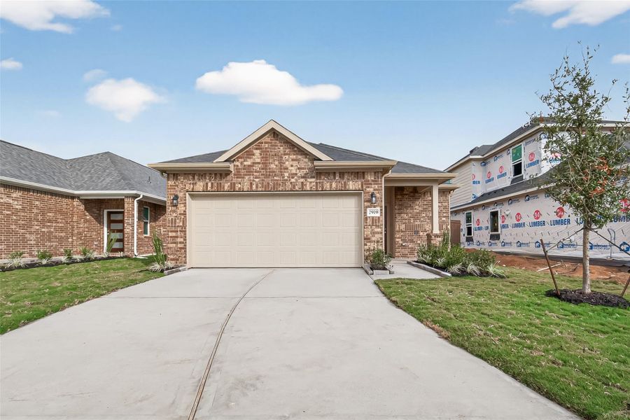 Front exterior of a new home in , Iowa Colony, TX, highlighting curb appeal (Image 20).