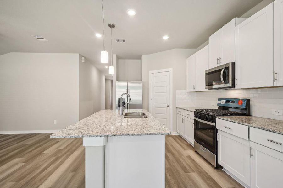 Furnished interior view inside a new home in Massey Oaks - Premier Series, Pearland (Image 6).
