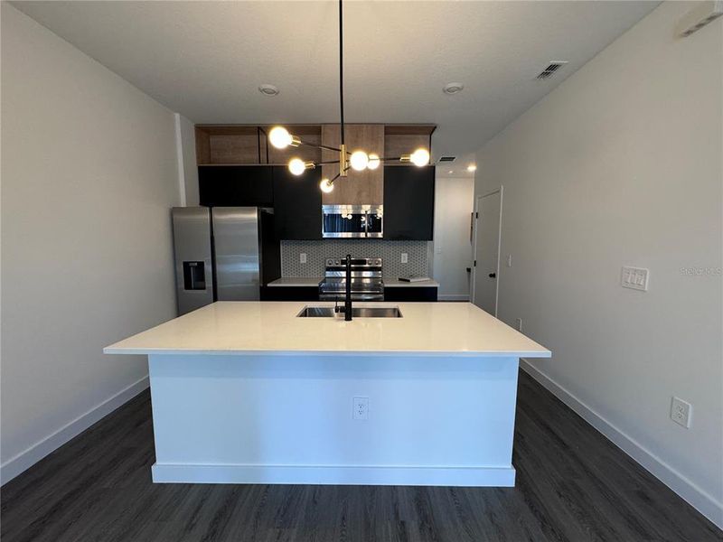 Furnished interior view inside a new home in , Kissimmee (Image 9).