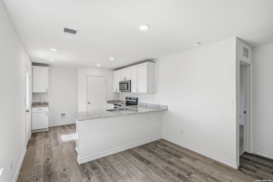 Furnished interior view inside a new home in Vista Real, Converse (Image 18).