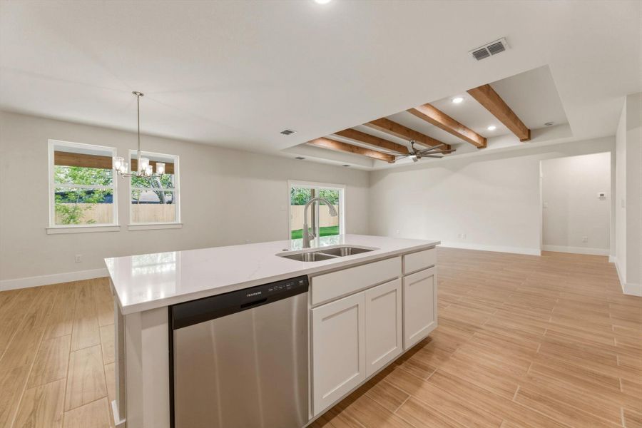 View from kitchen - dining area to the left and family room the right.  Very open and connected - great for family time or entertaining.