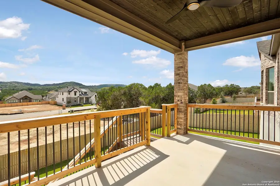 Exterior details and patio area of a home in Kinder Ranch 70's, San Antonio (Image 2).