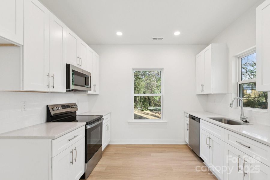 Furnished interior view inside a new home in , Charlotte (Image 6). Furnished interior view inside a new home in , Charlotte (Image 6).