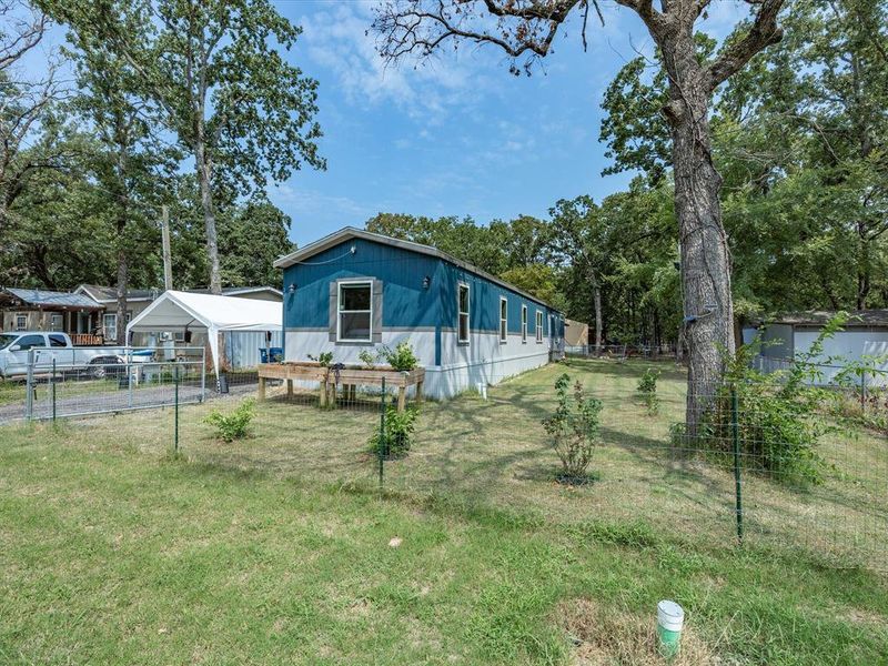 Front exterior of a new home in , Gun Barrel City, TX, highlighting curb appeal (Image 22). Front exterior of a new home in , Gun Barrel City, TX, highlighting curb appeal (Image 22).