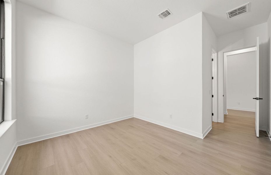 Representative unfurnished interior of a home built from the Dobbin by Pulte Homes in 6 Creeks, Kyle (Image 36).