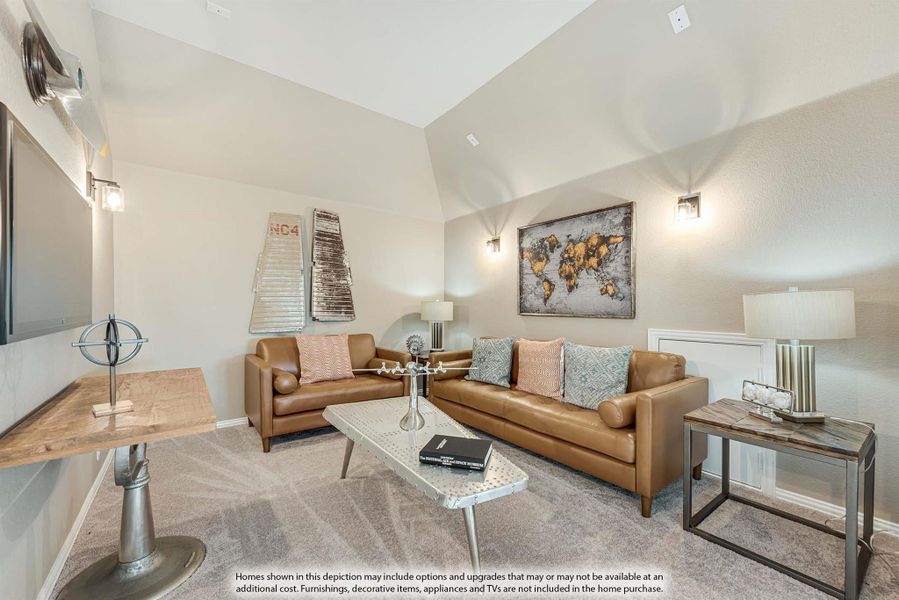 Living room with vaulted ceiling, tan leather sofas, carpet flooring, and wall art above seating area
