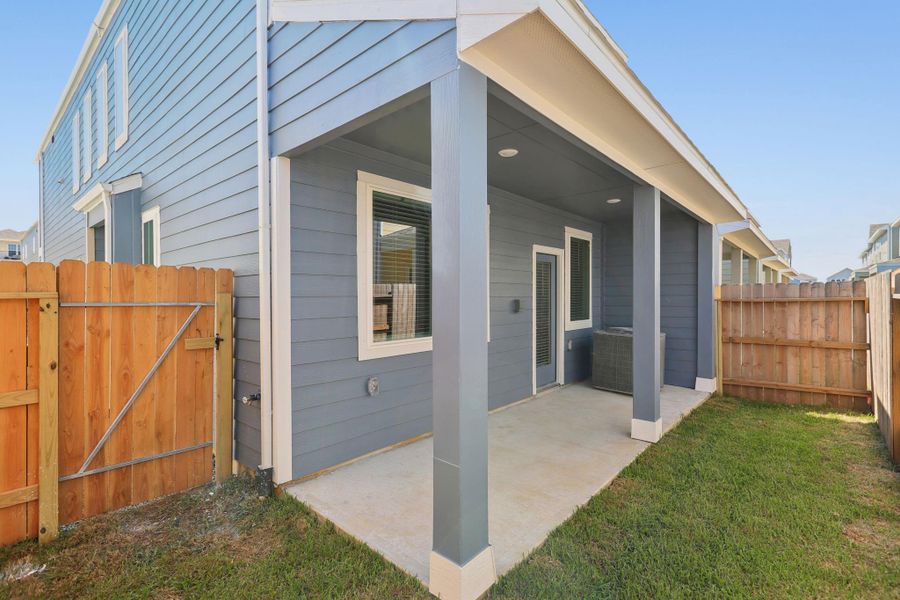 Exterior details and patio area of a home in Kemah Crossing - City Series, Kemah (Image 28). Exterior details and patio area of a home in Kemah Crossing - City Series, Kemah (Image 28).
