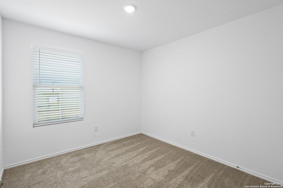 Spacious, unfurnished interior of a new home in Ruby Crossing: Cottage Collection, San Antonio (Image 19).