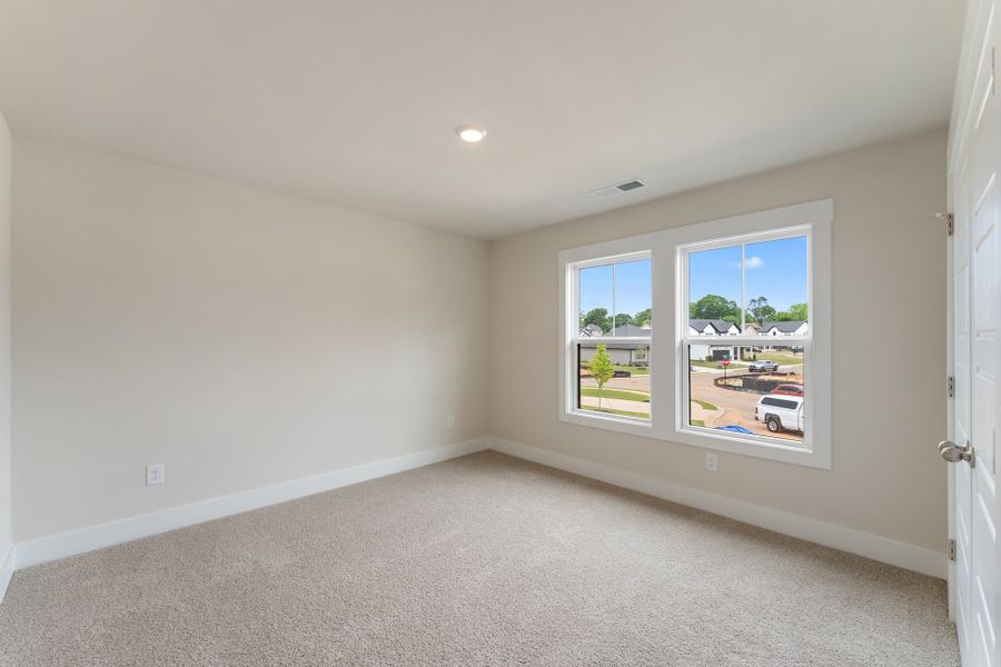 Representative unfurnished interior of a home built from the MacGregor II by Hunter Quinn Homes in The Meadows at Midway, Anderson (Image 13).