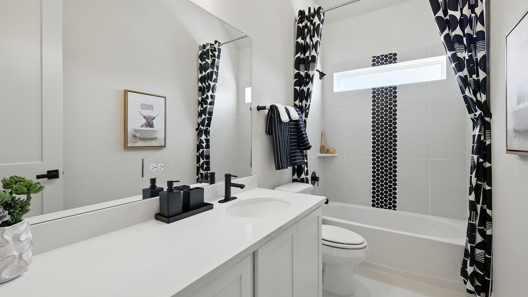 Representative furnished interior of a home built from the Juniper by Brightland Homes in Anna Ranch, Anna (Image 15).