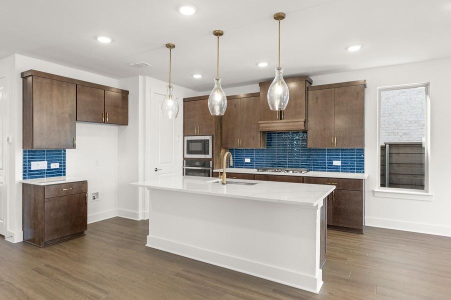 Furnished interior view inside a new home in Union Park, Little Elm (Image 5).