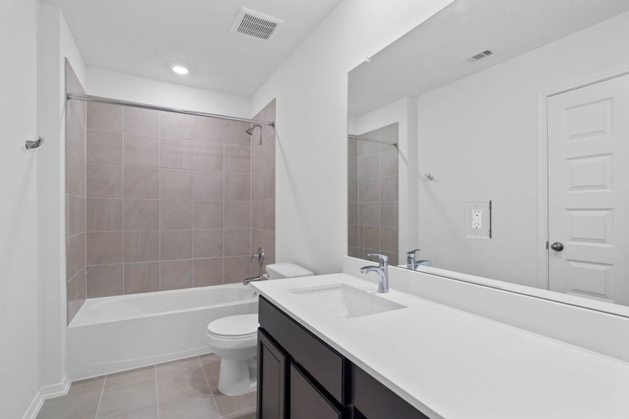 Furnished interior view inside a new home in Grace Landing, Willis (Image 8).