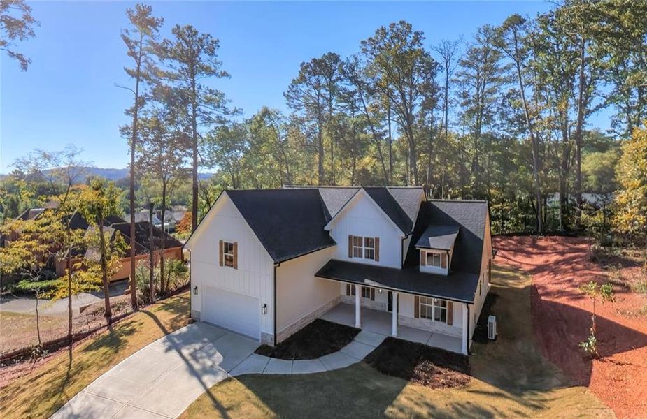 Front exterior of a new home in , Cartersville, GA, highlighting curb appeal (Image 2). Front exterior of a new home in , Cartersville, GA, highlighting curb appeal (Image 2).