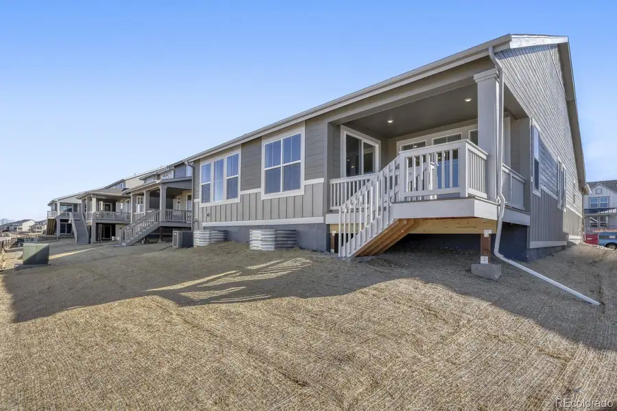 Exterior details and patio area of a home in Newlin Crossing, Parker (Image 2). Exterior details and patio area of a home in Newlin Crossing, Parker (Image 2).