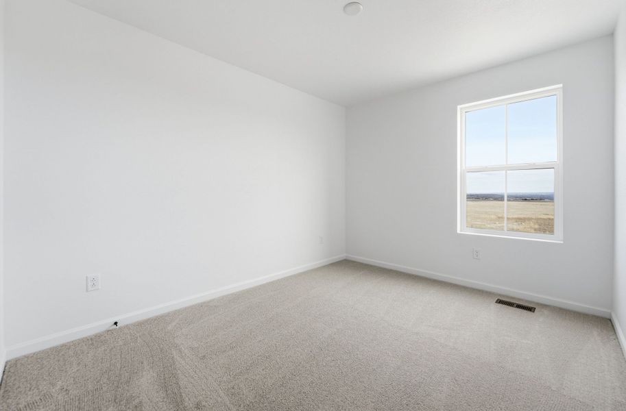 Spacious, unfurnished interior of a new home in Trailstone, Arvada (Image 32).