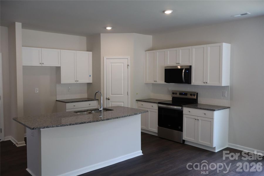 Granite countertops and Soft close cabinets