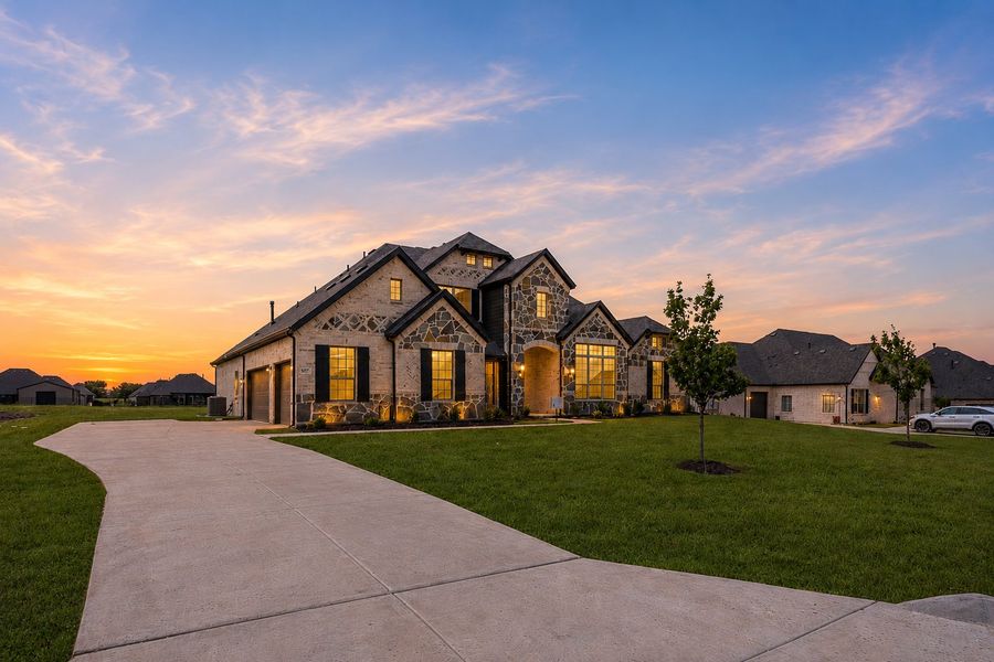 Front exterior of a new home in Heritage, McLendon-Chisholm, TX, highlighting curb appeal (Image 16).