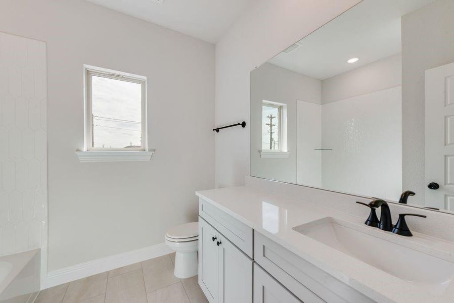 Furnished interior view inside a new home in Villages of Creekwood, Frisco (Image 11).
