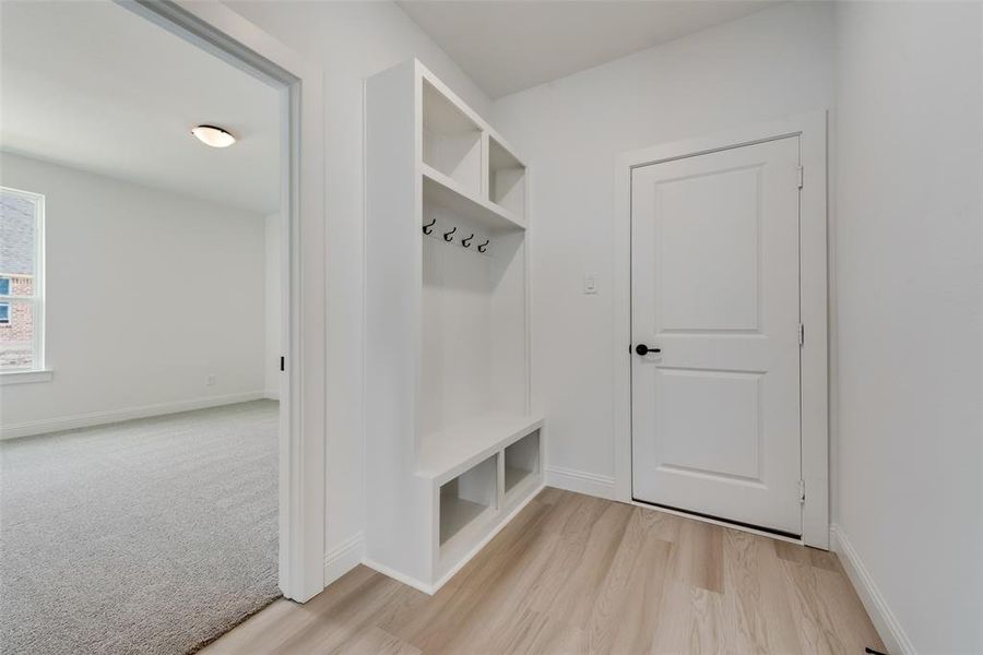 Mudroom featuring light hardwood / wood-style flooring