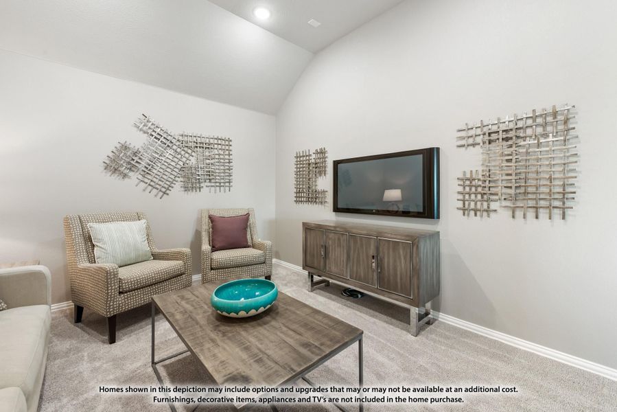 Living room with vaulted ceiling, two accent chairs, wall-mounted TV, and wood media console on carpet flooring