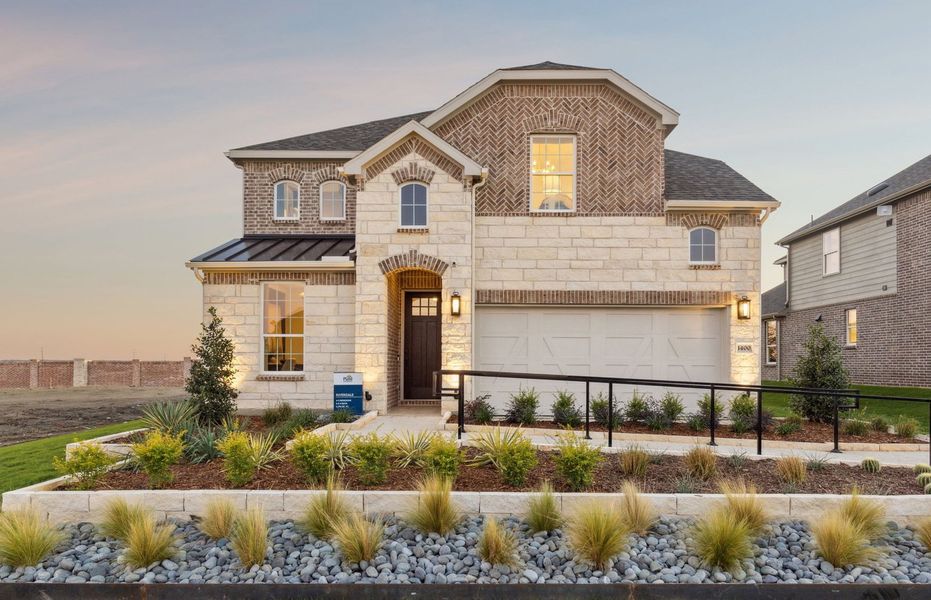 The Riverdale, a two-story home with 2-car garage