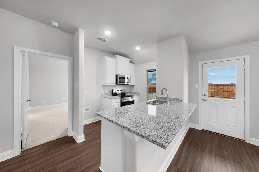 Furnished interior view inside a new home in Stonecreek, Sulphur Springs (Image 5).