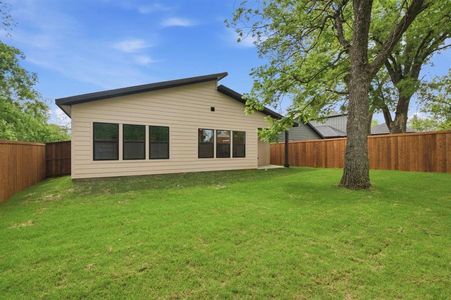 Exterior details and patio area of a home in , Denison (Image 3).