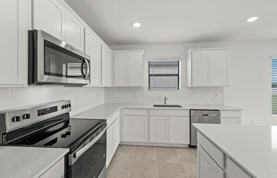 Furnished interior view inside a new home in Caloosa Cove, Labelle (Image 6).