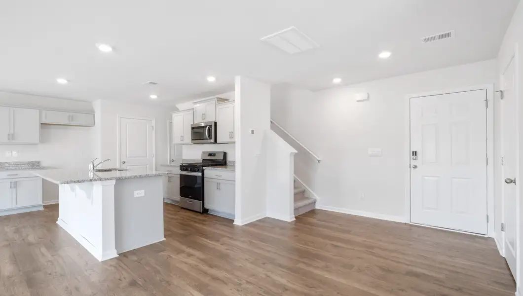 Representative furnished interior of a home built from the AISLE by D.R. Horton in Harrier Point, Woodruff (Image 5).