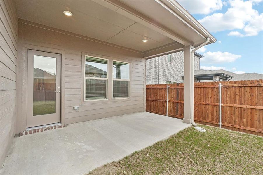 Exterior details and patio area of a home in Eastridge - Spring Series, McKinney (Image 4).