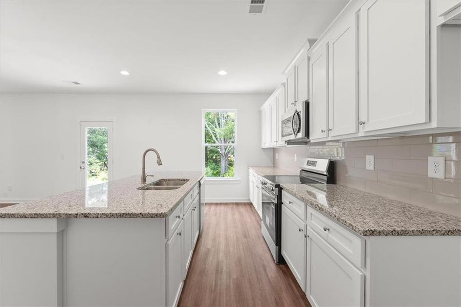 Furnished interior view inside a new home in Ellington Farms, Statham (Image 9).