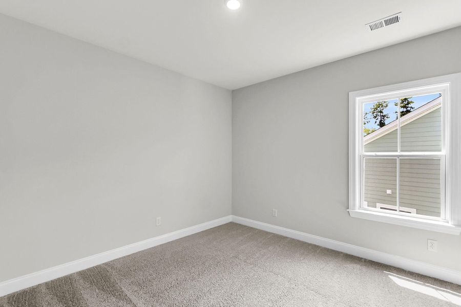 Spacious, unfurnished interior of a new home in Tidewater at Lakes of Cane Bay, Summerville (Image 31). Spacious, unfurnished interior of a new home in Tidewater at Lakes of Cane Bay, Summerville (Image 31).