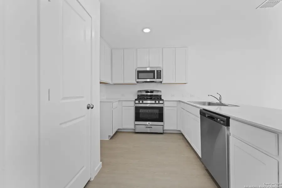 Furnished interior view inside a new home in Randolph Crossing: Cottage Collection, Converse (Image 4).