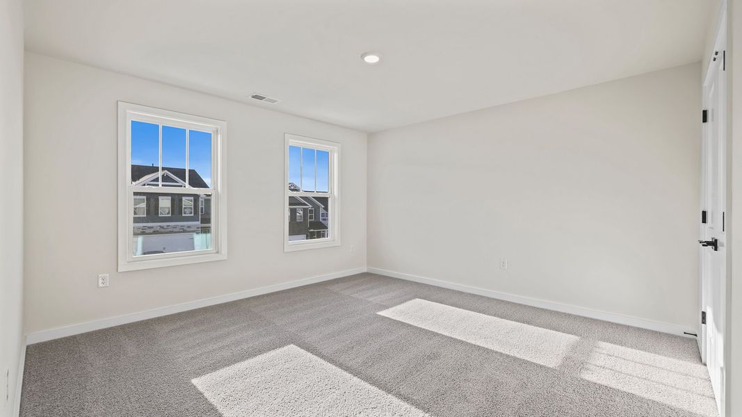 Spacious, unfurnished interior of a new home in Adams Glen, Greenville (Image 22).