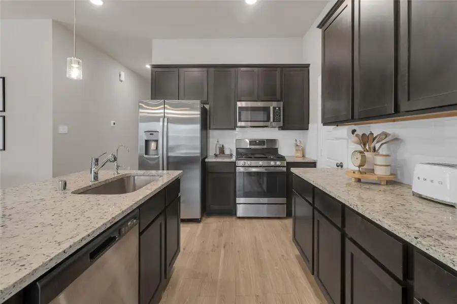 Furnished interior view inside a new home in Mustang Crossing, Alvin (Image 14).