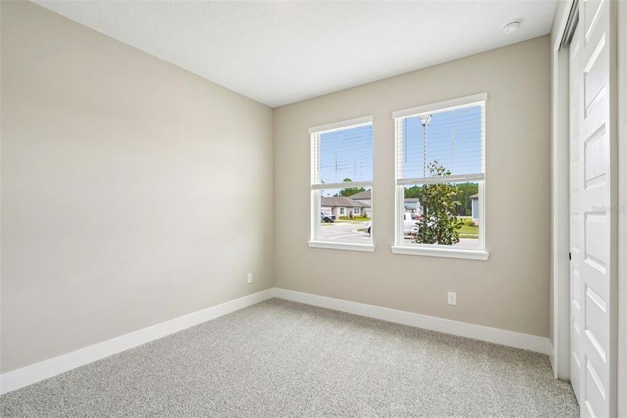 Spacious, unfurnished interior of a new home in Legends Preserve - Signature Series, Daytona Beach (Image 29).